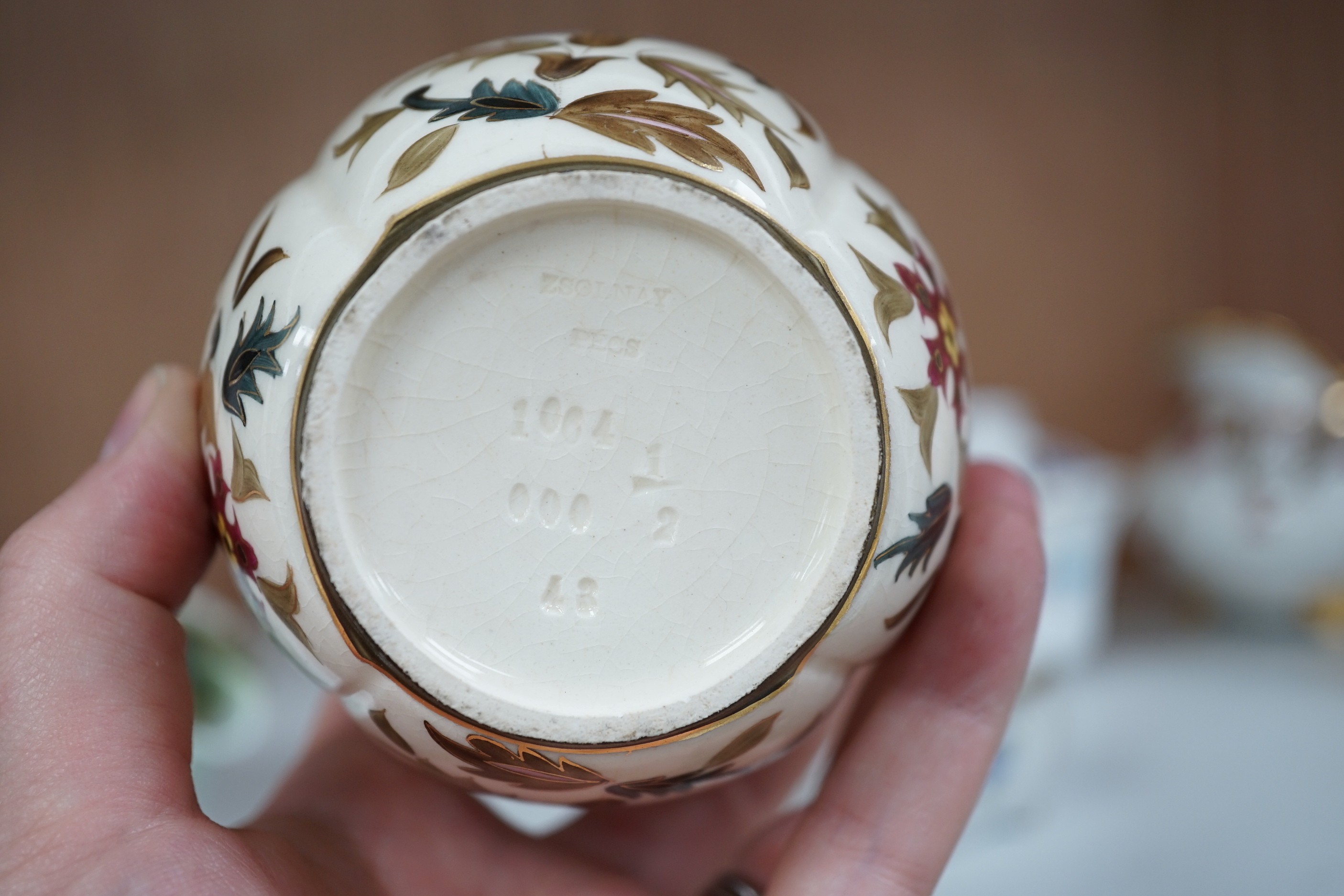 A large group of continental ceramics to include mainly 19th century including one piece of Zsolnay, Dresden wares, trinket boxes, a pottery and gilt metal mounted inkstand etc